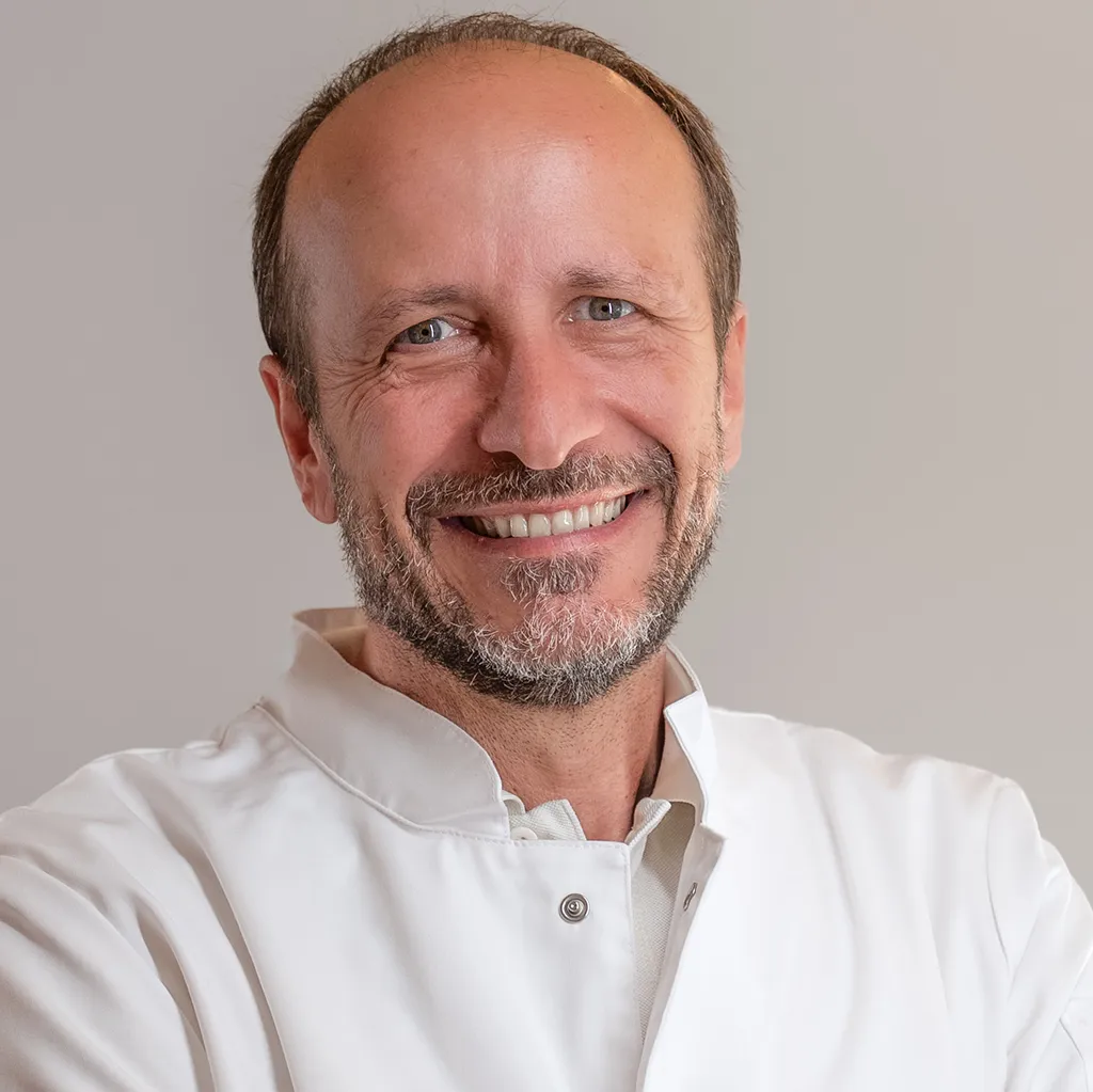 Dr. med.univ. Robert Melone
